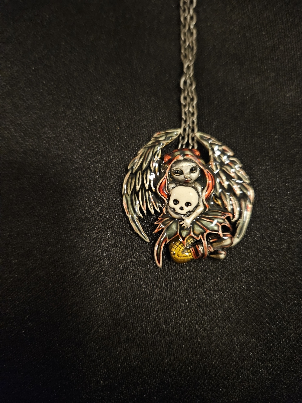 Silver Tone  Skull & Fairy Wing Pendant Necklace with Red Accents